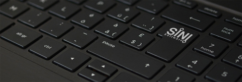Image of keyboard with sini software logo on the key for 3ds max